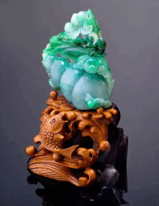 High-grade jadeite bangle with even emerald color