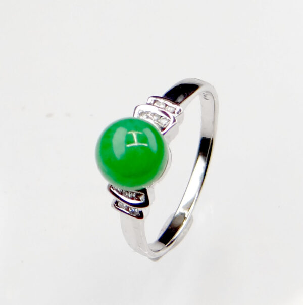 A stunning Natural Douqing Jade Ring featuring a rich green jade centerpiece, elegantly set in polished 18K white gold and adorned with sparkling micro-set diamonds.