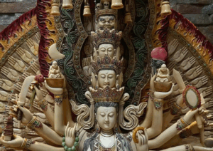 Close-up detail of the Thousand-Hand Guanyin ivory carving