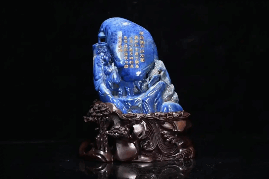 Qing Dynasty lapis lazuli mountain carving with detailed landscape scene