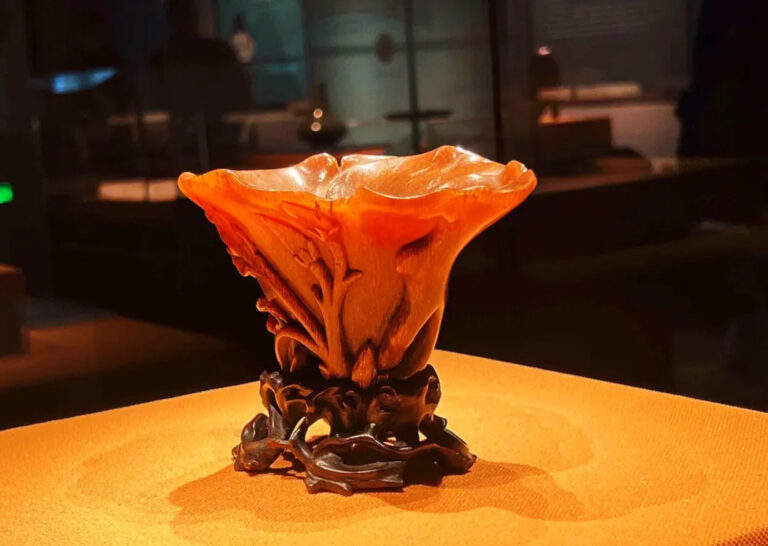 Ming Dynasty rhinoceros horn cup showing fish-roe patterns under magnification