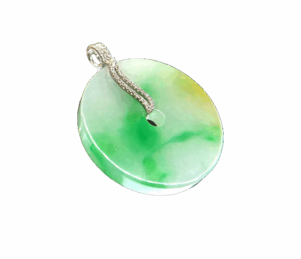 A stunning Natural Jade Peace Pendant featuring a smooth, translucent jade center with a warm green hue, elegantly framed by an 18K white gold clasp adorned with pavé-set diamonds.