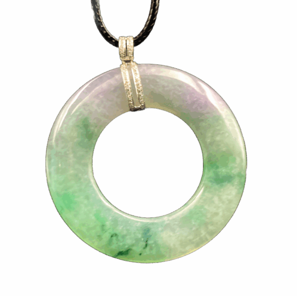 A stunning round "Spring with Color" jadeite pendant (53x5 mm) showcasing a harmonious blend of light purple and green hues, set in 18K white gold with a sparkling diamond clasp. The fine, translucent texture and smooth polish highlight its natural beauty.