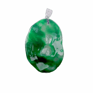 A stunning "Spicy Green" old pit emerald pendant featuring intricate "Enlightenment" carving, set in 18K white gold with sparkling diamond accents. The deep green gemstone contrasts elegantly with the gleaming metal.