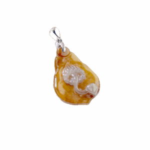 A stunning close-up of the Natural Ice Yellow Jadeite Magnolia Pendant, showcasing its delicate honey-like hue and intricate hand-carved magnolia petals, set with a sleek 18K white gold clasp.