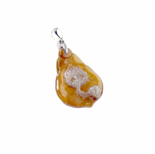 A stunning close-up of the Natural Ice Yellow Jadeite Magnolia Pendant, showcasing its delicate honey-like hue and intricate hand-carved magnolia petals, set with a sleek 18K white gold clasp.