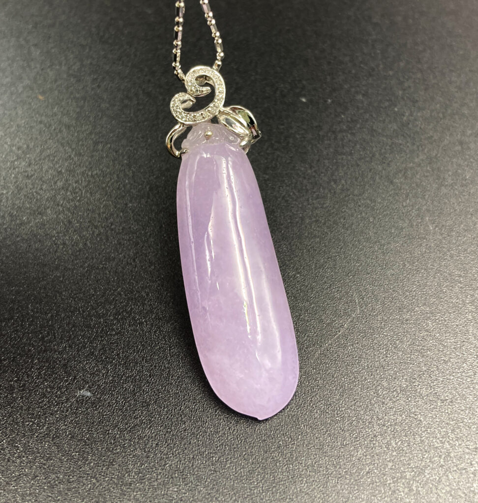 Natural Ice-type Violet Jadeite Peach-shaped Pendant Set with 18K White Gold and Diamonds