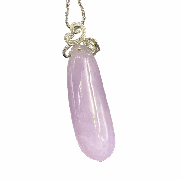 A finely carved lavender jadeite longevity peach pendant with a smooth, polished surface, set in 18K white gold and adorned with sparkling diamonds. The delicate craftsmanship highlights the jade's translucent glow and elegant contours.