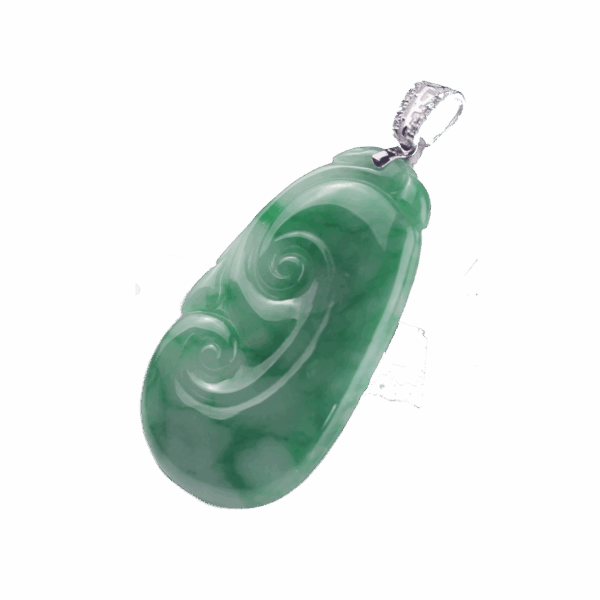 A stunning close-up of the Natural Flower Jade Ruyi Pendant, showcasing its vibrant green hue and intricate 18K white gold diamond clasp. The jade’s natural patterns and the diamonds’ sparkle are highlighted under soft lighting.