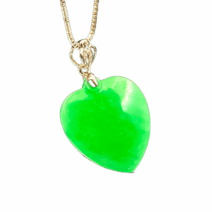 A stunning Natural Emerald Heart Pendant featuring a full-green, ice-type emerald carved into a smooth apricot heart shape, set in luxurious 18K white gold with delicate diamond accents. The pendant glistens under light, showcasing its rich color and exquisite craftsmanship.