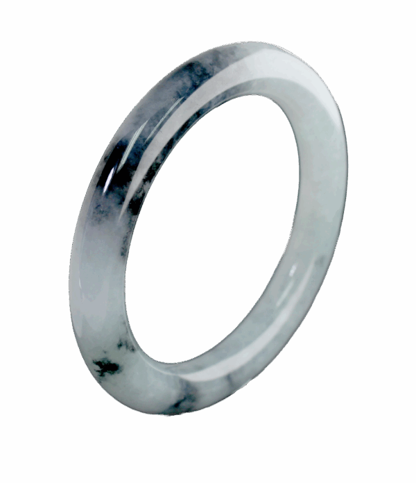 A stunning Natural Ice-type Black Chicken Jade Bracelet resting on a silk cloth, showcasing its ice-clear base and elegant ink-like veins. The smooth, polished surface reflects light beautifully, highlighting its natural artistry.