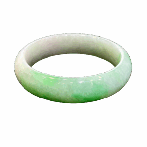 A stunning close-up of the Natural Jadeite Ice Bean Bracelet, showcasing its translucent ice bean texture and naturally distributed emerald green veins, resting elegantly on a silk cloth.