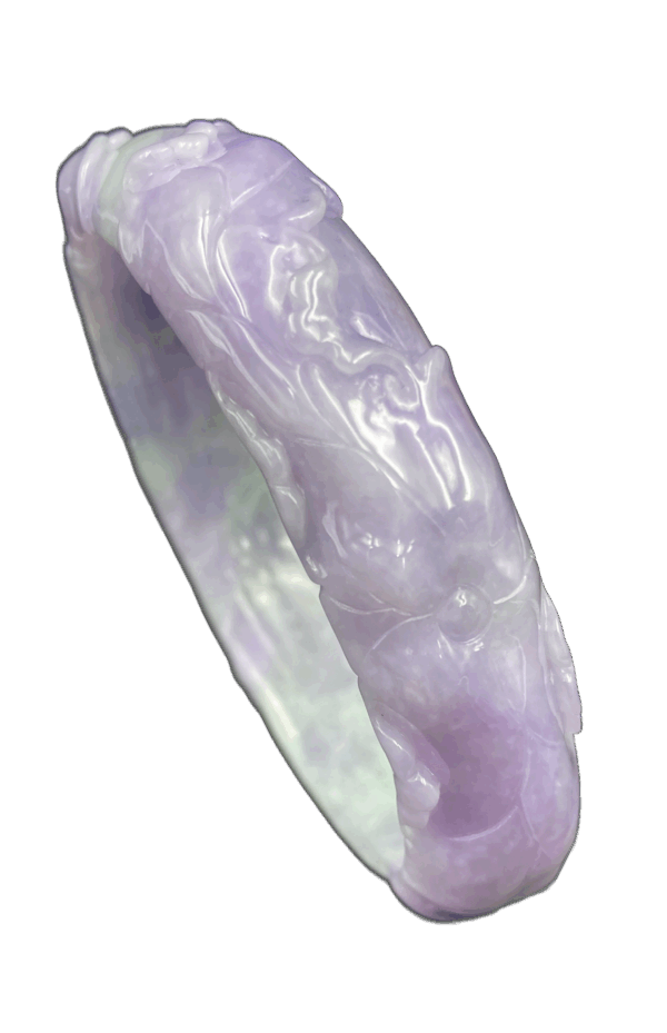 A stunning violet jadeite bracelet featuring intricate relief carvings of traditional auspicious patterns, showcasing the natural gradient and fine-grained texture of the gemstone. The elegant design and lustrous sheen make it a must-have for collectors.