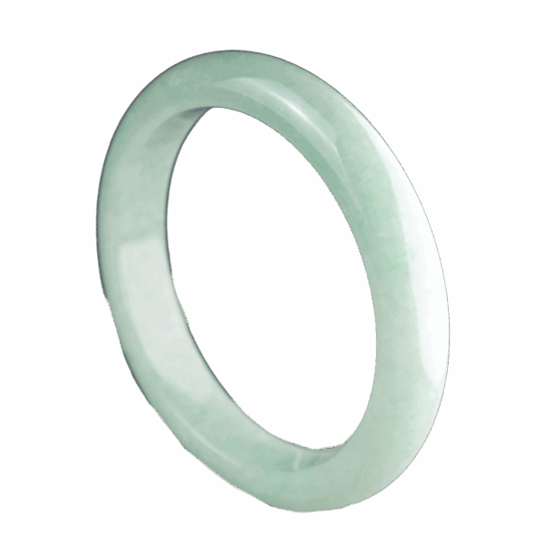 A beautifully polished Natural Douqing Jadeite Bracelet resting on a silk cloth, showcasing its smooth texture and elegant light green hue, symbolizing tranquility and sophistication.