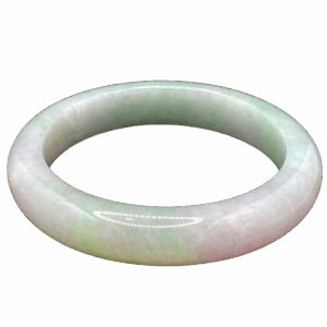 A stunning Natural Emerald Spring-with-Color Bracelet with smooth, lustrous jade in delicate lavender and green hues, elegantly displayed on a wrist. The colors blend naturally, highlighting its fine craftsmanship and timeless beauty.