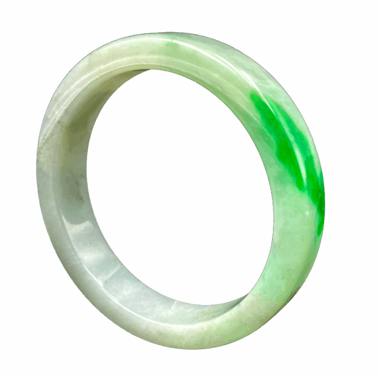 A stunning spicy green jade bangle with intense color and a polished glass-like sheen, resting on a soft fabric background, showcasing its flawless craftsmanship and natural beauty.