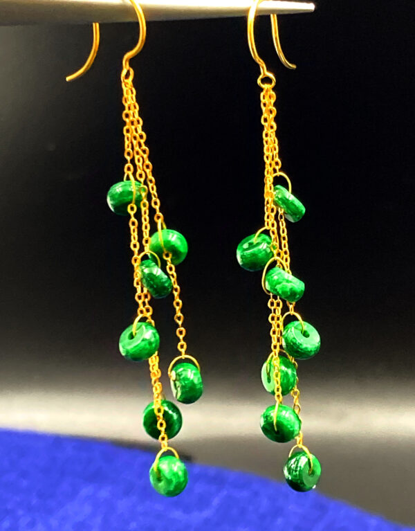 A pair of elegant Natural Jadeite Beaded Tassel Earrings featuring deep green jadeite beads (8mm diameter) connected to 18K gold-plated chains, showcasing a graceful layered design with a smooth, polished finish.