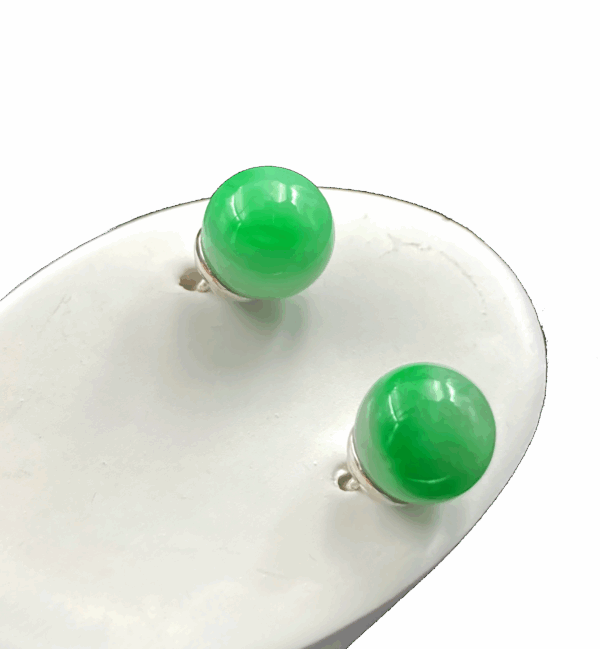 Elegant Bai Di Qing jadeite earrings featuring smooth, round 7.9mm beads with striking green and white contrast, set in minimalist 18K white gold for a modern yet classic look.