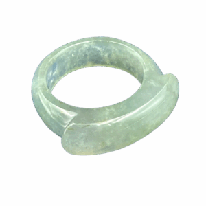 A stunning icy white jadeite saddle ring, showcasing its translucent, smooth texture and elegant saddle-shaped design, resting on a soft fabric background.