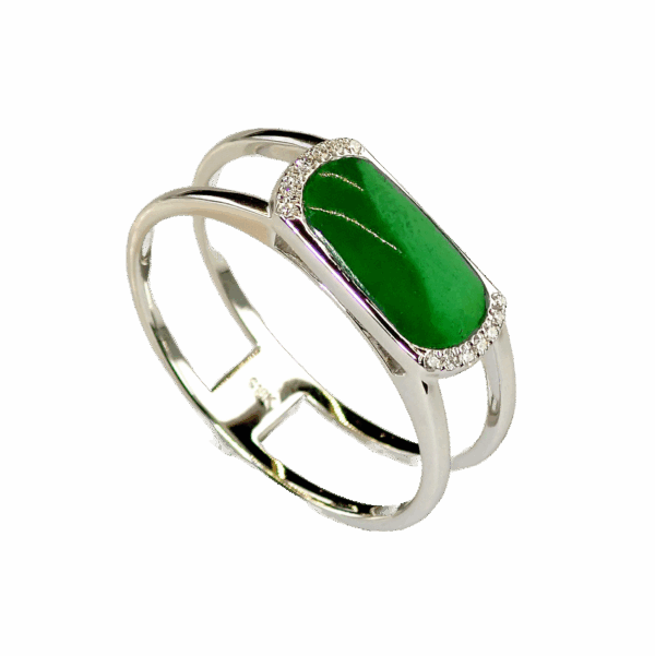 A stunning close-up of the Natural Ice-type Green Marquise Emerald Ring, showcasing its vivid green emerald centerpiece, surrounded by sparkling diamonds on an elegant 18K white gold band.