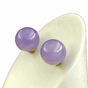 A pair of elegant violet jadeite stud earrings, set in lustrous 18K yellow gold, showcasing the translucent purple hue and smooth polish of high-quality icy-type jadeite. Perfect for adding a touch of oriental sophistication to any outfit.