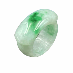 A smooth, polished natural jadeite saddle ring with delicate green hues, resting on a soft fabric background, showcasing its classic and minimalist design.