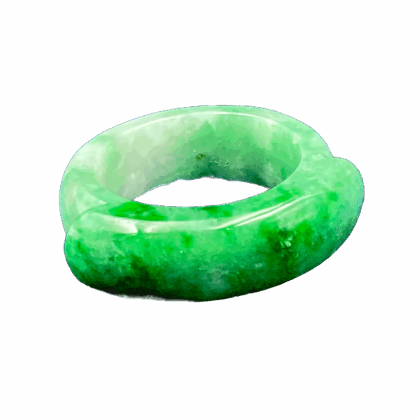 A stunning natural jadeite saddle ring featuring a rich, translucent green hue, meticulously polished for a glossy finish. The curved design rests comfortably on the finger, showcasing the pure beauty of jadeite without metal settings.