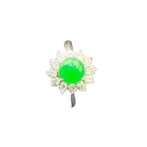 A stunning close-up of a vibrant full-green jadeite cabochon ring, elegantly set in platinum and surrounded by sparkling diamonds, showcasing its rich color and luxurious craftsmanship.