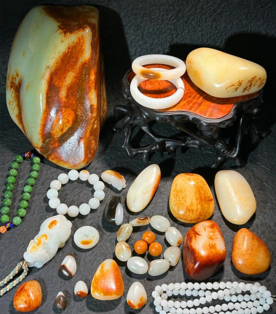 Jadeite cabochon displaying imperial green colour zoning and vitreous lustre.