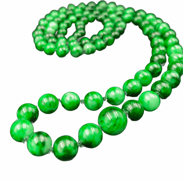 A stunning close-up of Natural Flower-veined Jade Pagoda Beads, highlighting the intricate color veins and smooth polish of each round bead, elegantly draped or layered for versatile wear.