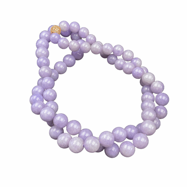 A stunning close-up of the Ice-Type Lavender Jadeite Beaded Necklace, showcasing its translucent, glossy beads in a delicate lavender hue. The 18K gold clasp embedded with diamonds adds subtle luxury, while the smooth, mirror-like finish highlights expert craftsmanship.
