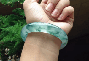 Measure your hand for the right size jade bracelet