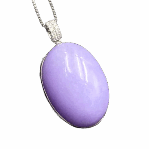 A stunning Natural Violet Jadeite Cabochon Pendant in 18K White Gold, adorned with sparkling diamonds. The delicate purple hue of the jadeite contrasts beautifully with the bright white gold setting, creating a luxurious and timeless piece.