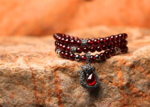 Ancient Egyptian garnet necklace display