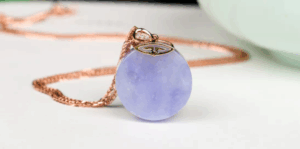 UV light demonstration revealing chemical treatments in fake 'Type A' jade