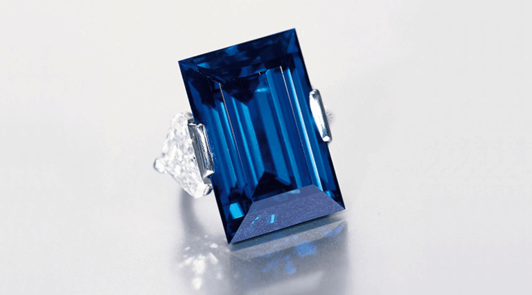Rockefeller Sapphire ring with diamond side stones